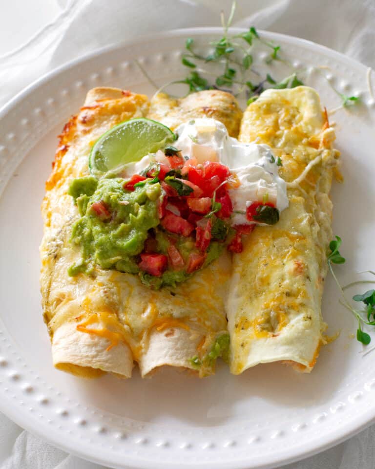 Cream Cheese Chicken Enchiladas - The Girl Who Ate Everything