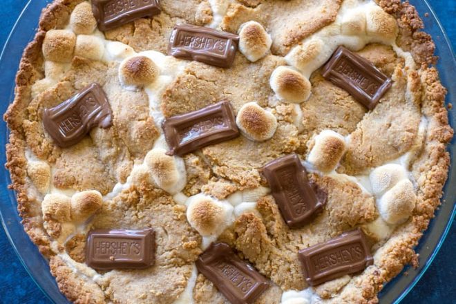 Easy S'mores Pie - layers of graham cracker dough, marshmallows, and chocolate. the-girl-who-ate-everything.com