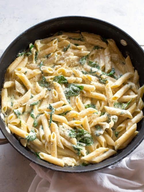 One-Pan Spinach Artichoke Pasta (+VIDEO) - The Girl Who Ate Everything