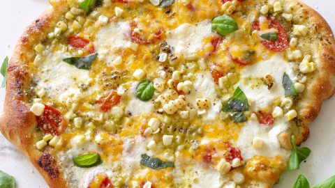 Charred Corn Tomato and Basil Pesto Pizza