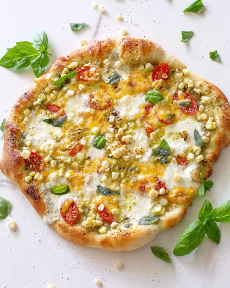 Charred Corn, Tomato, and Basil Pesto Pizza - The Girl Who Ate Everything